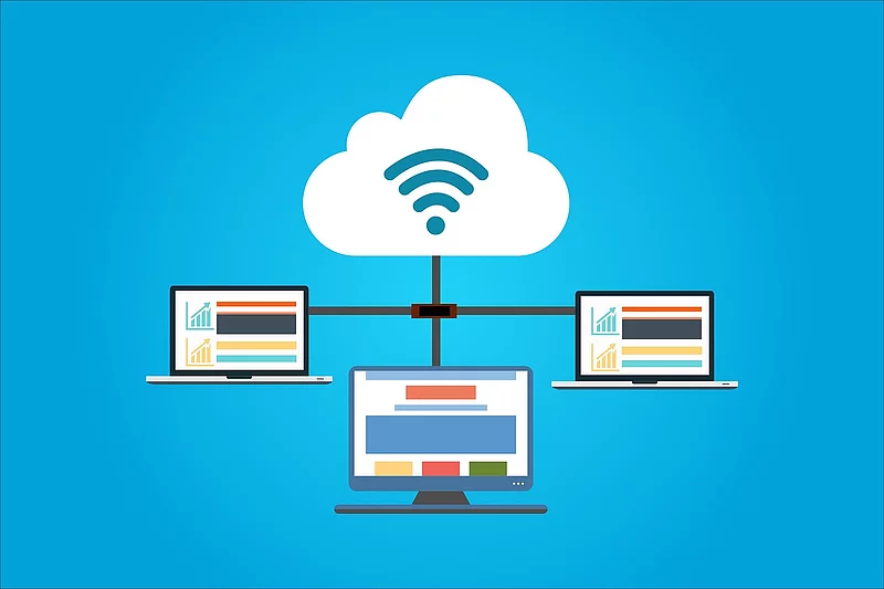 Illustration Cloud Computing Wolke mit Wlan Symbol und 3 darunter verbundene Computer
